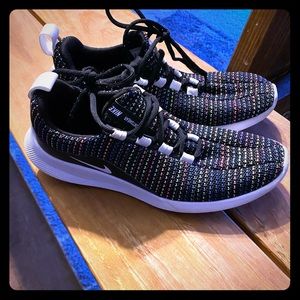 Woman’s Nike Tennis Shoes